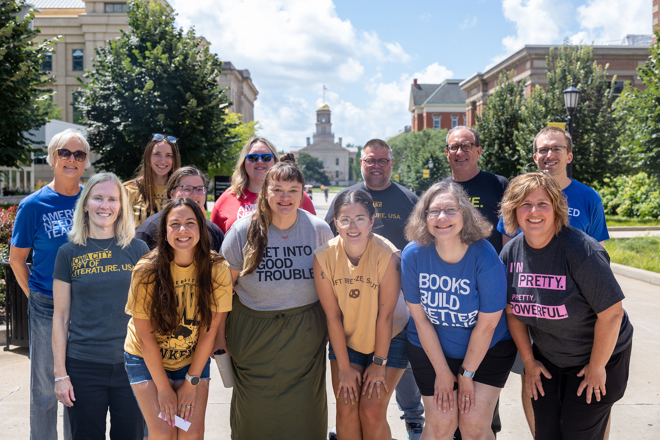 Educators standing in front of the University of Iowa Old Capitol